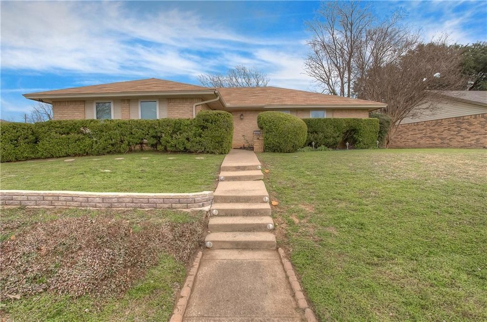 7051 Willowview St! Pretty corner lot with landsca