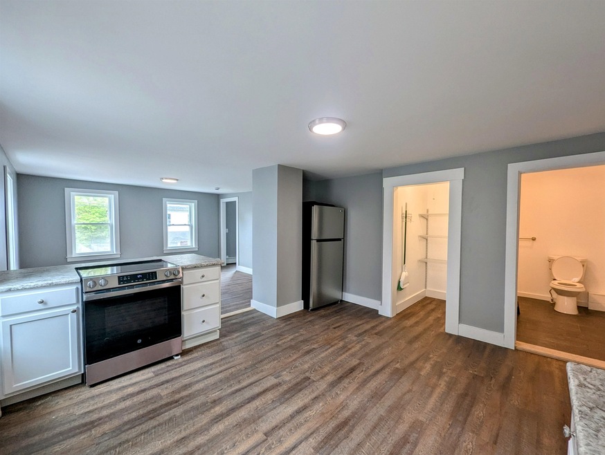 13-15 Walnut St unit 4, Claremont, NH 03743 - photo 1