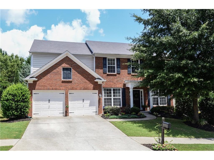 BEAUTIFUL FOUR BEDROOM HOME LOCATED IN THE WOODLAN