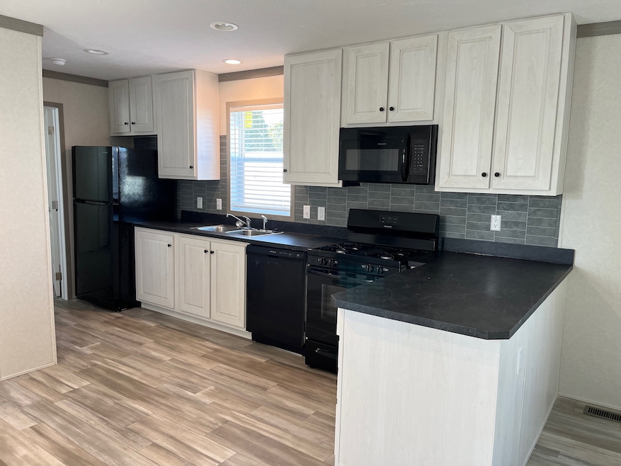 151 Donald Ave unit 151, Lansing, MI 48906 - photo 1