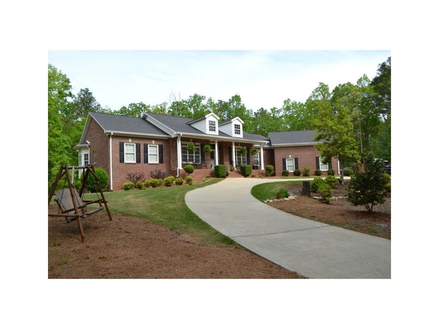 EXECUTIVE HOME ON 5 ACRES WITH IN-LAW SUITE! HANDI