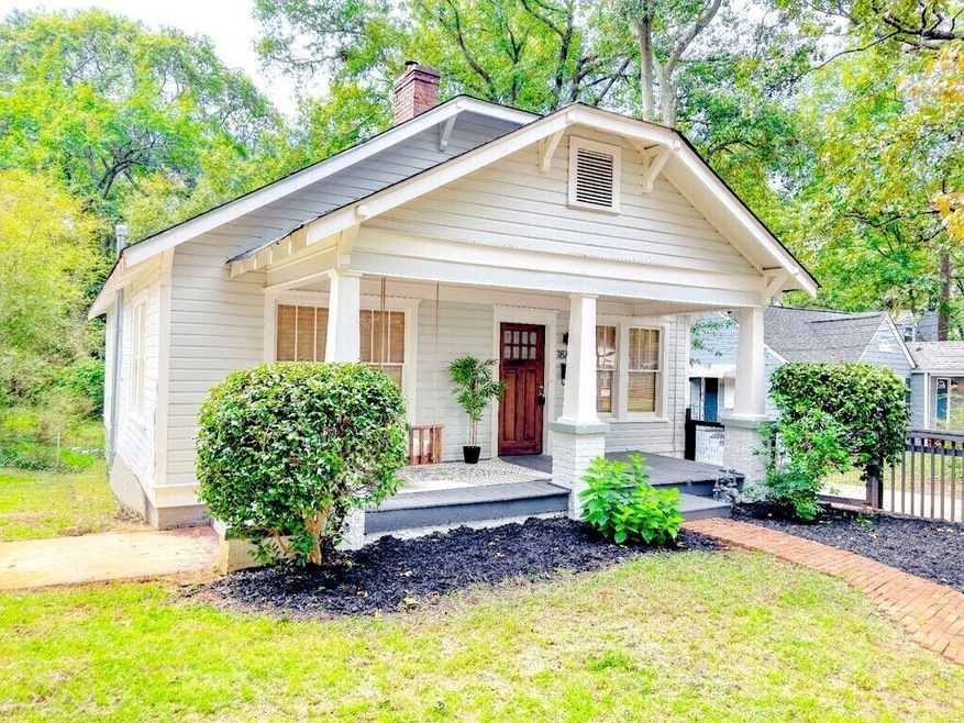 Welcome to this charming Craftsman bungalow, nestl