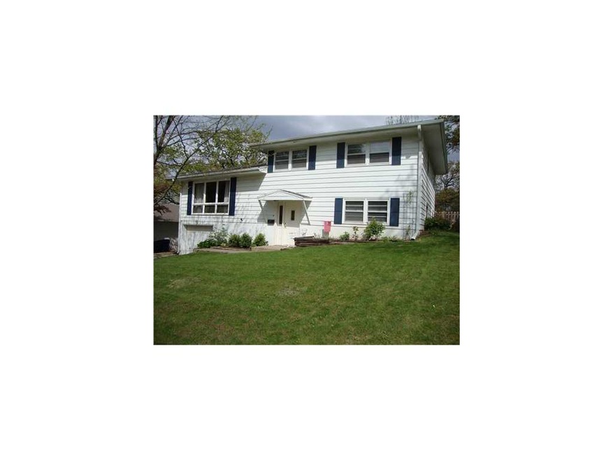 Front Exterior. This well-kept home is on a tree l