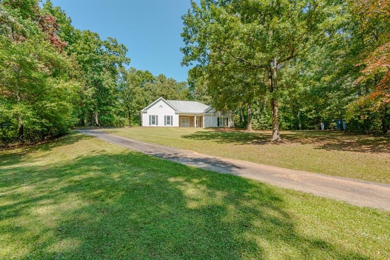 Welcome home to your own private oasis on 2 1/2 ac