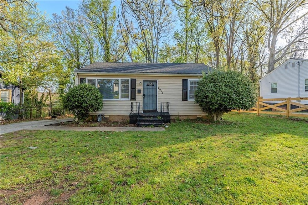 View of front of house featuring driveway, crawl s