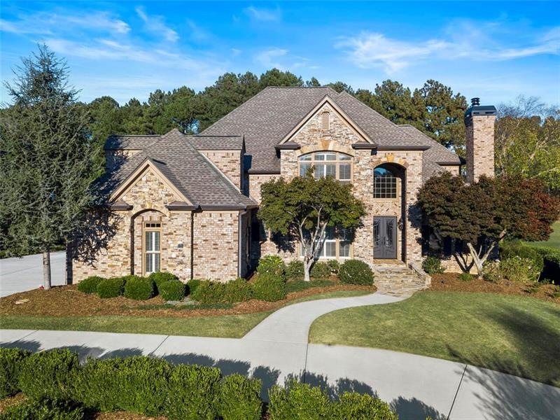 Sought after 4 sided brick home with circular driv