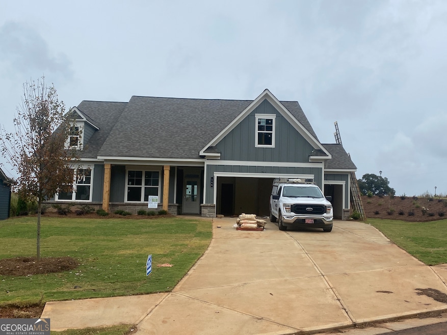 Actual photo of the home w a carriage garage attac