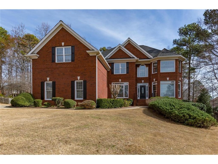 Three sided brick w/ a Finished Terrace Level on a