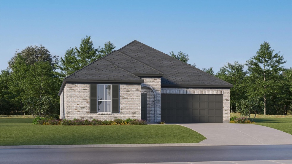 View of front of house with brick siding, a shingl