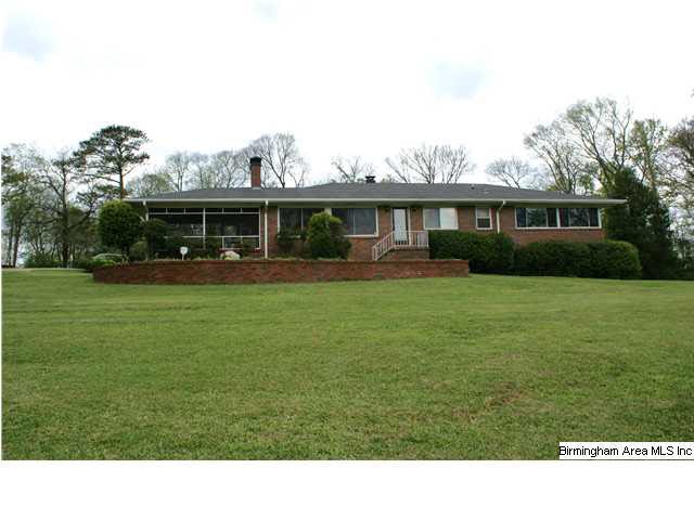 One of the original estate lots in Vestavia, this 