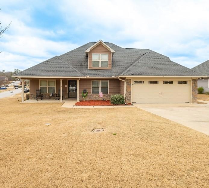 View of front of home featuring a garage