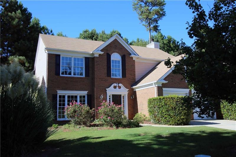 Beautiful brick front home in popular swim/tennis 