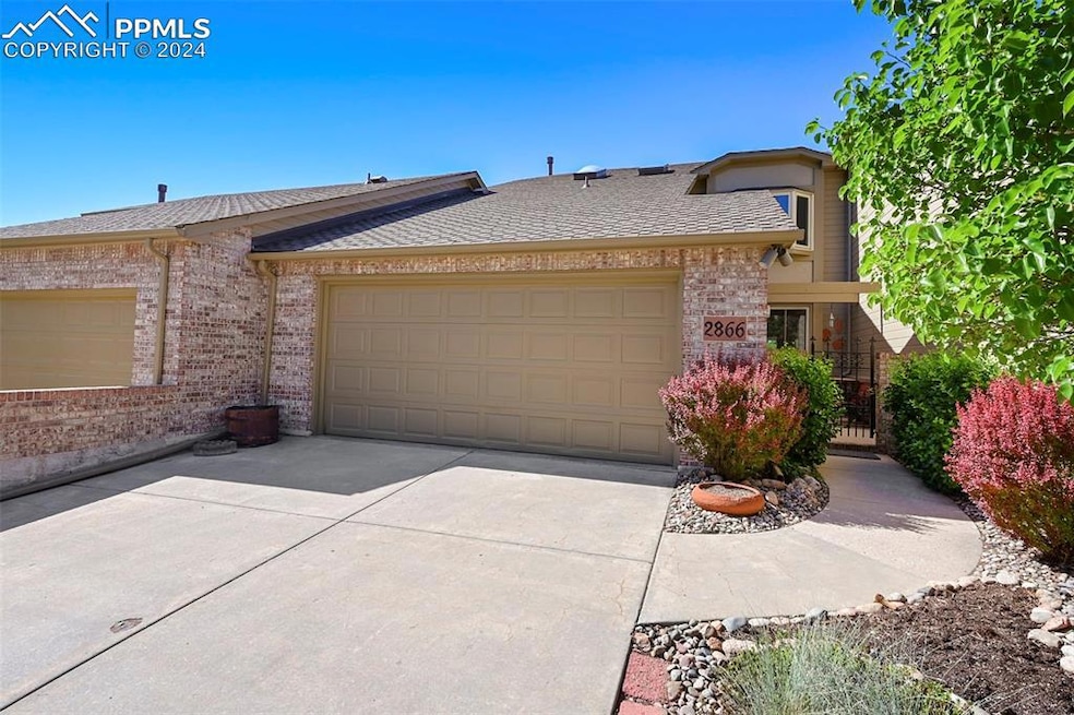 Ranch-style house with a garage