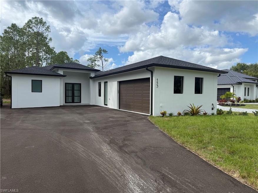 153 Everglades Blvd N, Naples, FL 34120 - photo 1