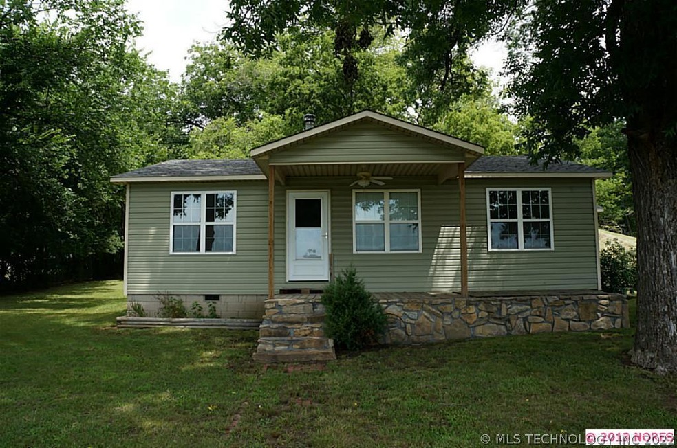 enjoy the country setting on this cute front porch