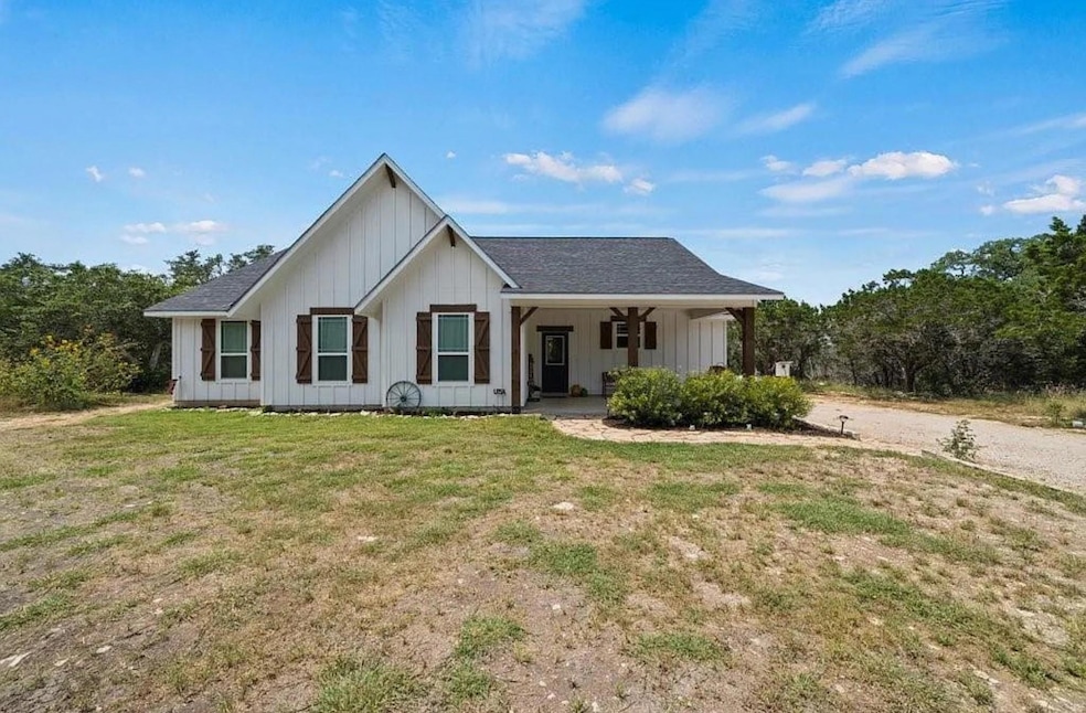Modern inspired farmhouse with board and batten s