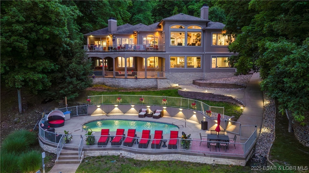 Take lake life to the next level with this 5 bed,