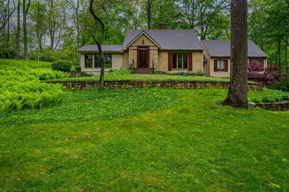 Everything about this estate is wonderfully unique. 1.52 scenic acres within Washington TWP has a country feel. Breathtaking views of the wooded lot from every room of the nearly 3000 sq ft Main House or the 540 sq ft Cottage. The Gourmet Kitchen has