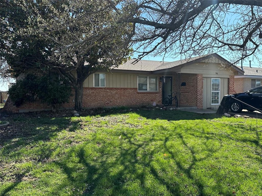 Single story home with a front lawn