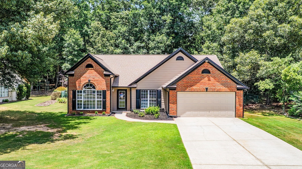 5637 Newberry Point Dr, Flowery Branch, GA 30542 - photo 1