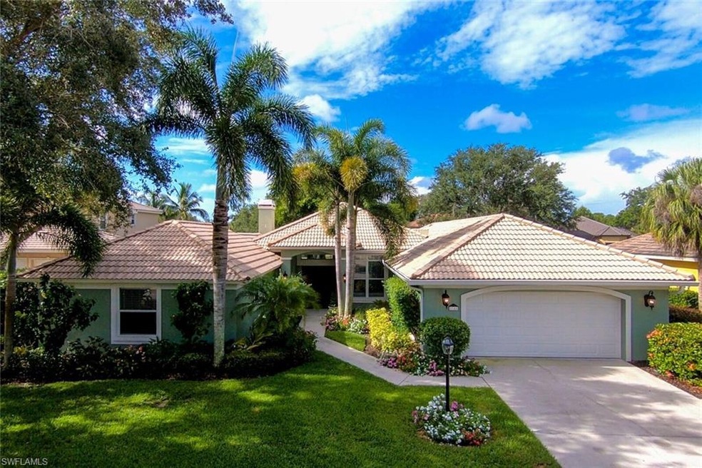 Beautifully landscaped home situated on peaceful c