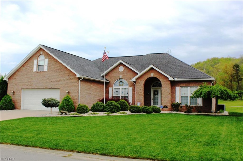 Beautiful brick ranch overlooking Woodridge Planta