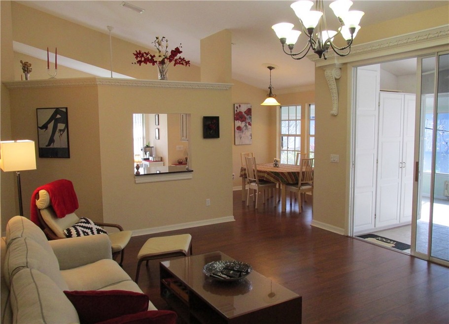 Living Room to Porch, Dining Room and Kitchen