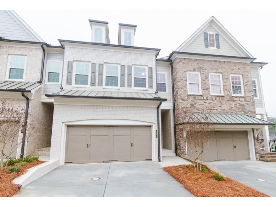Homesite 56 features a painted brick unit with a c