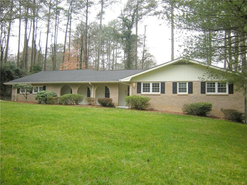 This LARGE brick and frame ranch has an ENORMOUS k