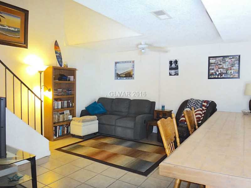 Property Photo. Open Living Room/Kitchen Design