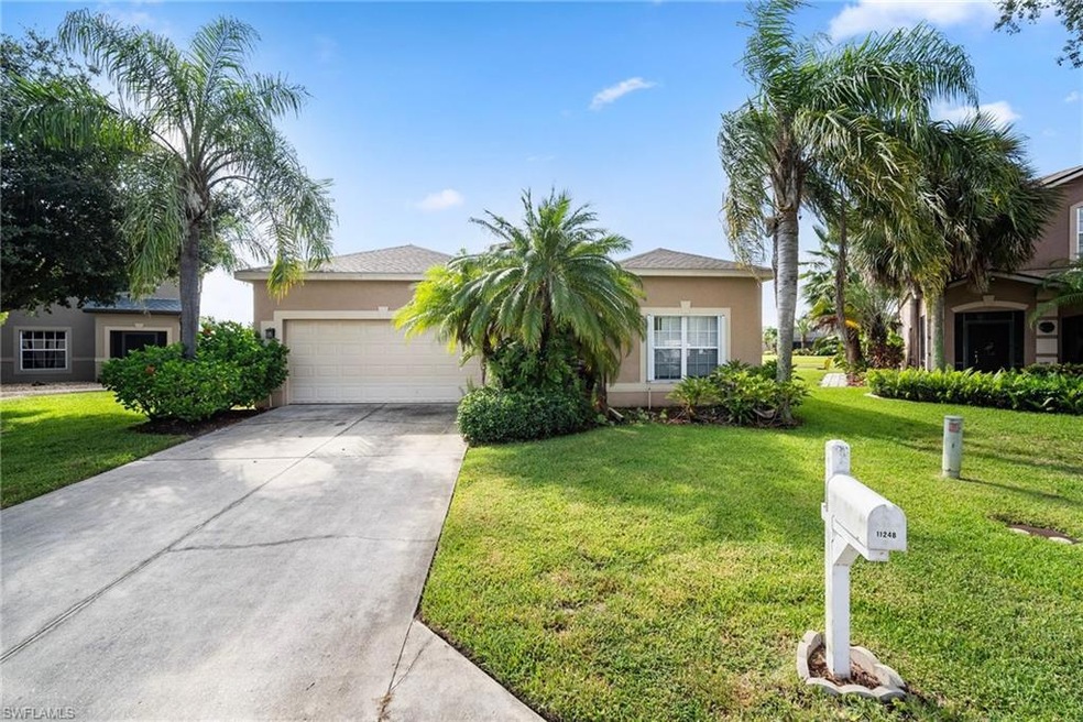 View of front of property with a front yard and a 