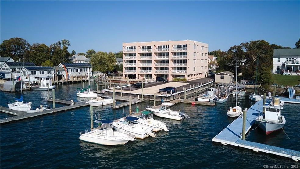 Wow! View of the rear building with boat slips in 