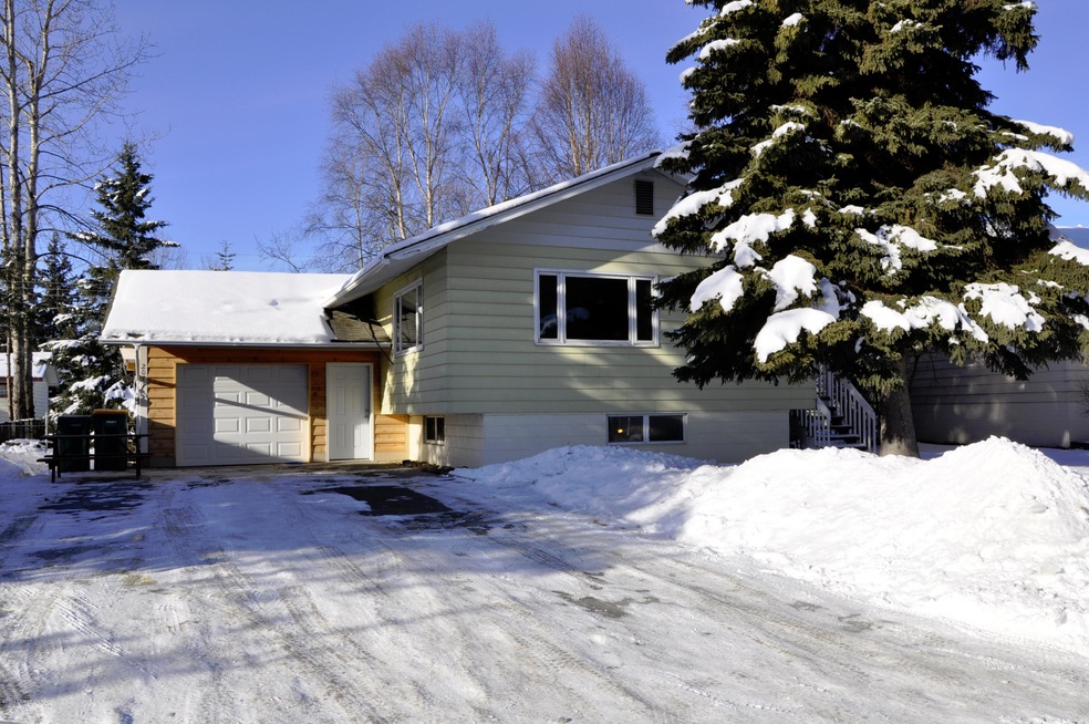 Wide driveway welcomes you Home