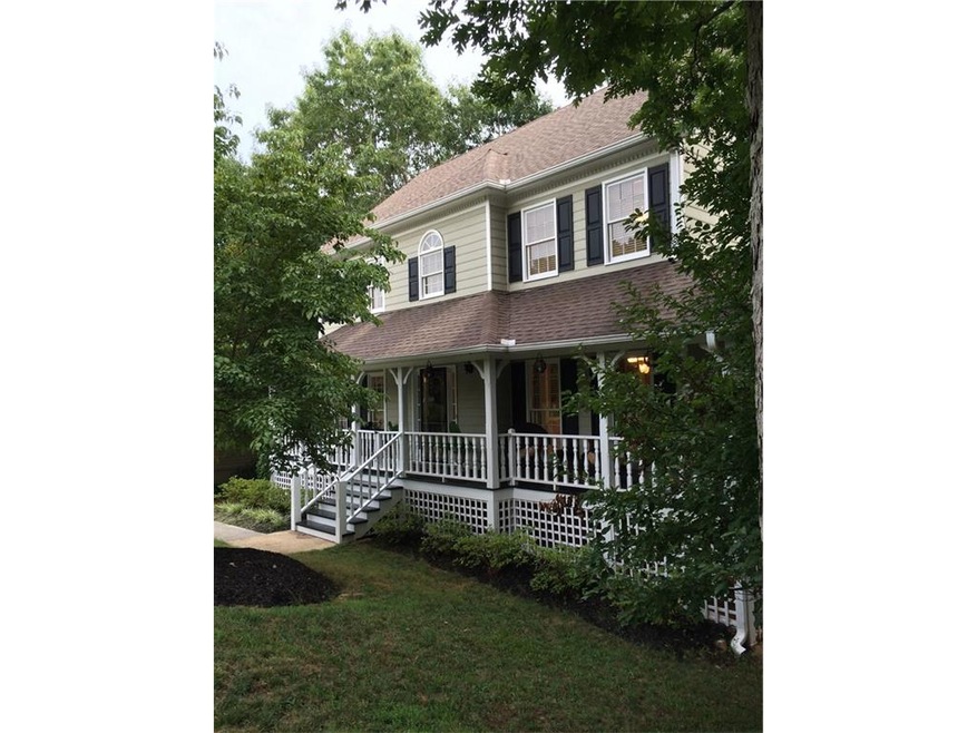 Rocking Chair Front Porch with Azaleas and Dogwood