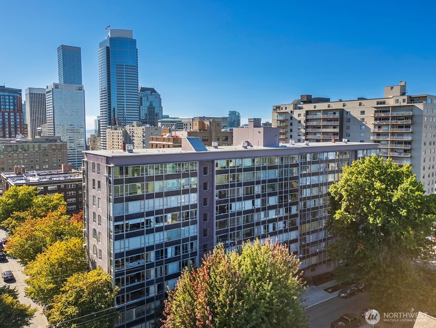 Welcome to Sutton Place! A Mid-Century condo in the heart of First Hill's residential district.