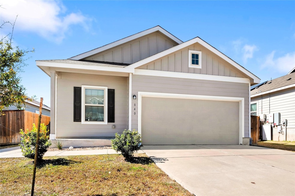 View of front of home with board and batten sidin