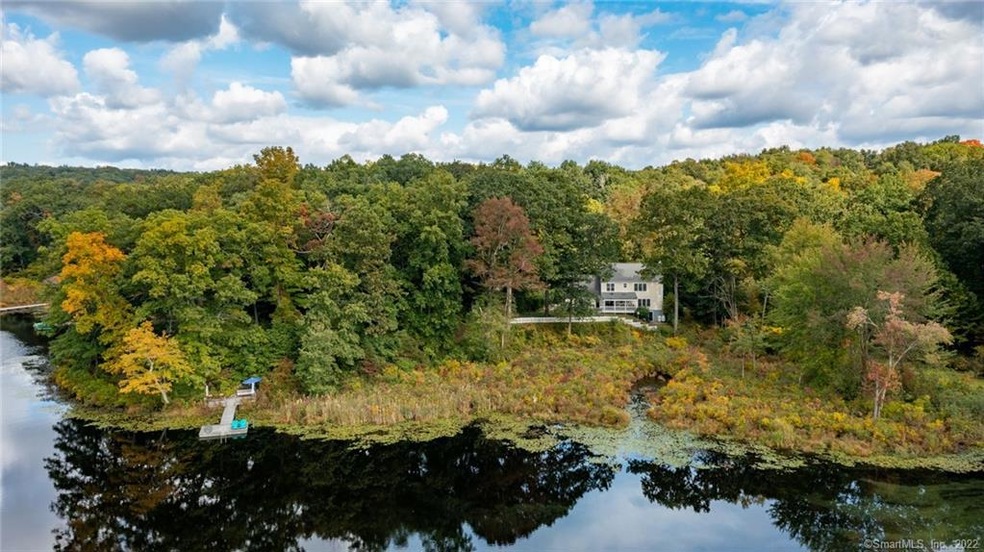 Stunning waterfront home offers a private retreat.
