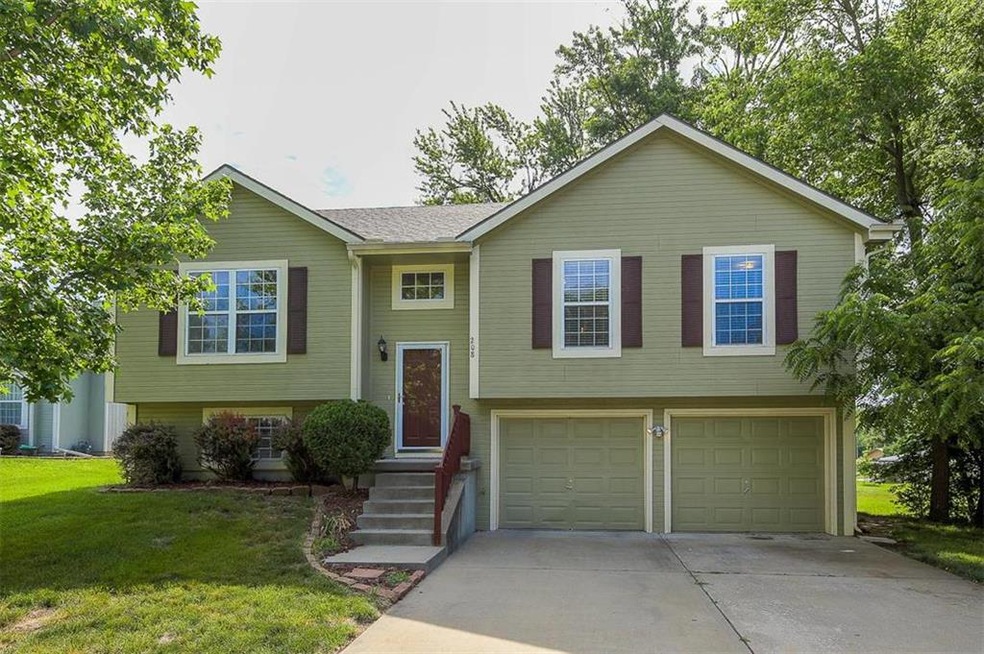 Charming home surrounded with mature trees.