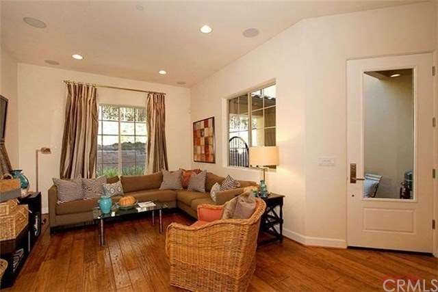 Beautiful wood flooring in this comfortable living