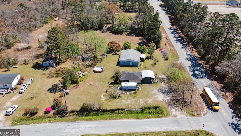 717 Noel C Conaway Rd, Guyton, GA 31312 - photo 1