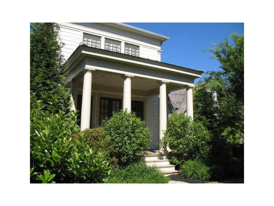 Exterior Front. Charleston Inspired Cottage with P
