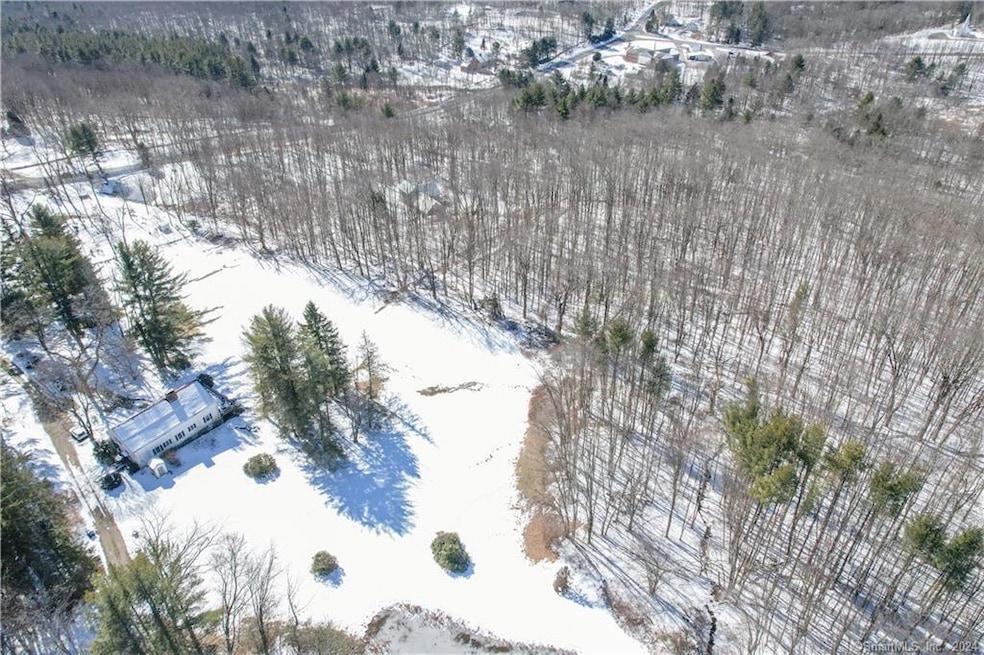 Parcel is to right of existing house