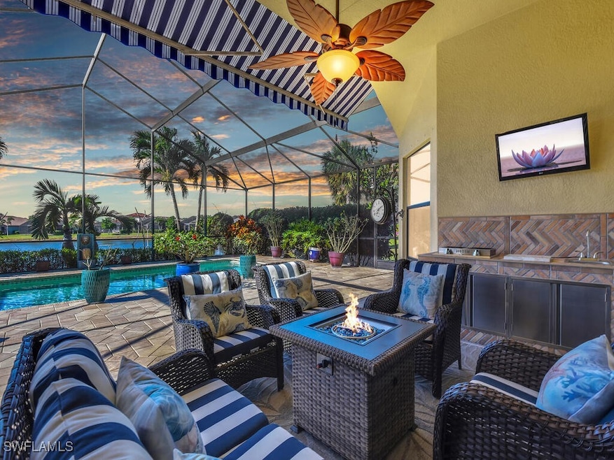Patio terrace at dusk with a lanai and an outdoor
