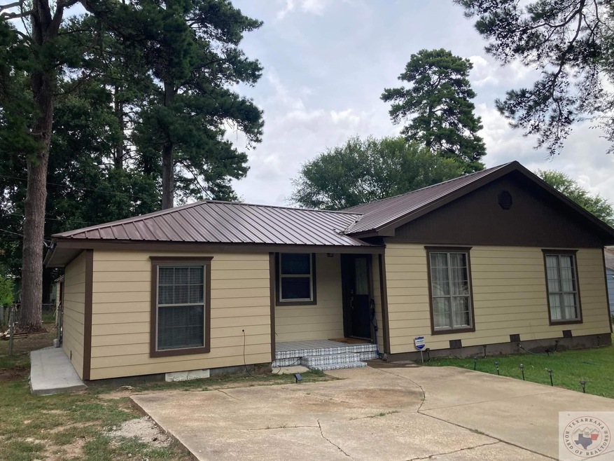 831 Burma Rd, Wake Village, TX 75501 - photo 1