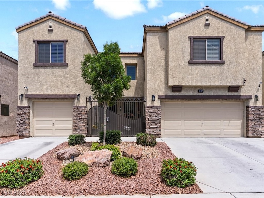 View of front of property with an attached garage,