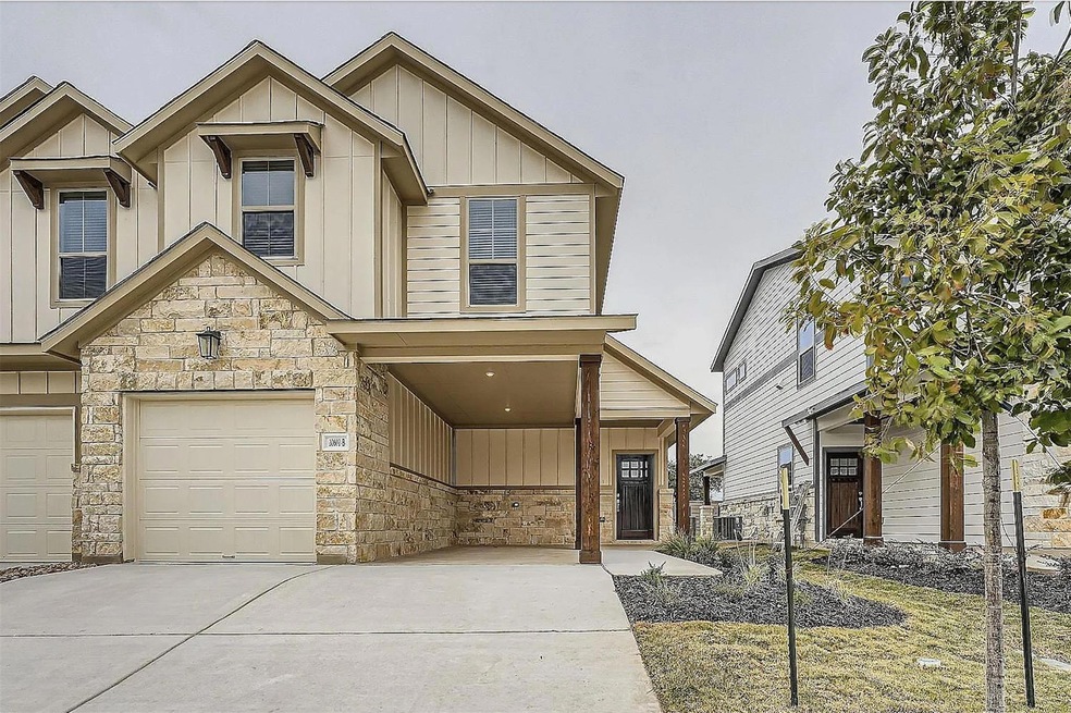 View of front of property with board and batten s