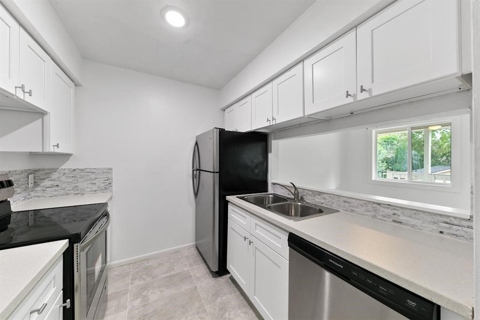 1312 W Adoue St unit 7, Alvin, TX 77511 - photo 1