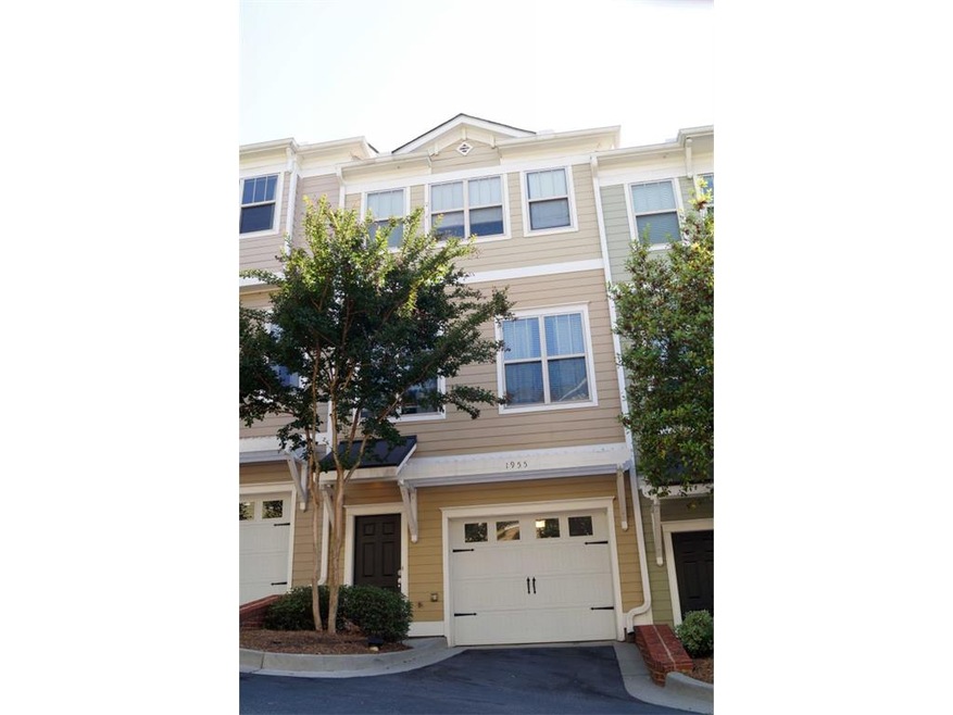Exterior front view with 1 car garage