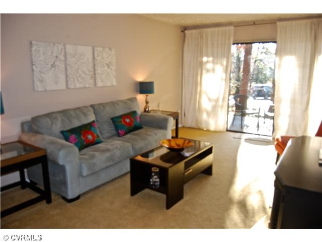 Living Room - Opens to ground floor patio!
