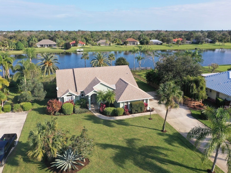 Aerial of home and lake